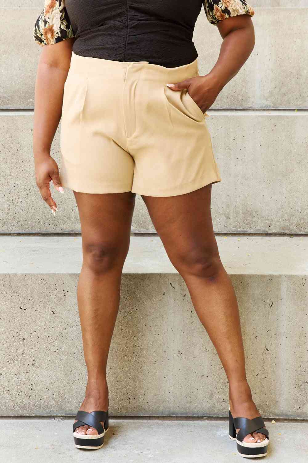 Pleated High Waisted Shorts in Sand - EMMY